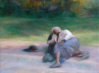 Homeless woman sleeping on sidewalk